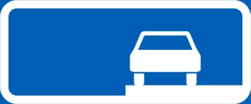 Lisäkilvellä osoitetaan ajoneuvon sijoitus reunakiveen nähden.